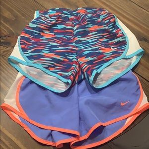 2 pairs Girls Nike shorts size Medium.